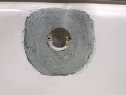 Repairing holes is a cost effective way to improve the look of any plaster wall. Bathtub Drain Overflow Rust Hole Repair