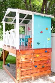 Sitting area and play kitchen inside. How To Build An Outdoor Playhouse For Kids Houseful Of Handmade