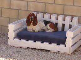 Place a dog cushion on it and place a pallet dog bed inside the pallet dog house. Pin By Elizabeth Eads On Craft Ideas Pallet Dog Beds Old Pallets Dog Furniture