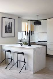 Marble kitchen countertops look amazing and can bring a sense of luxury and elegance to your space. Waterfall Marble Kitchen Island Modern Kitchen Magdalena Keck Interior Design