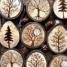 The fractal wood burning process is a technique of applying high voltage electricity on the wood to create lichtenberg designs. Wood Burned Pine Tree Wood Slice Magnet Handmade By Forage Etsy In 2021 Wood Burning Crafts Wood Slice Magnets Wood Burning Art