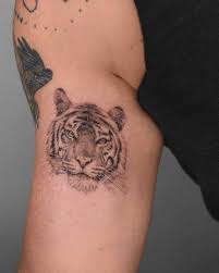15 Best Tiger Head Tattoo Designs And Ideas Petpress In 2021 Tiger Head Tattoo Arm Tattoos Tiger Head Tattoo