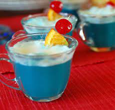 This Adorable Ducky Baby Shower Punch Made With Blue Kool Aid Gives The Look Of Bath Water And Bubbles Ma Baby Shower Punch Punch Recipes Blue Baby Shower Food
