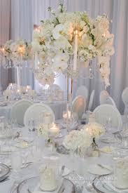 A White Wedding At Four Seasons Toronto Wedding Decor Toronto Rachel A Cling Flower Centerpieces Wedding White Wedding Flowers Beautiful Wedding Centerpiece