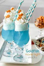 Mermaid munch snack mix and tubs. 21 Marvelous Mermaid Party Ideas For Kids Movie Night Snacks Birthday Party Snacks Party Snacks