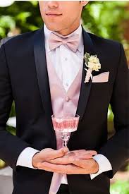 Groom Is Wearing The Lorenzo Tuxedo Complete With Blush Pink Champagne Www Fria Tuxedo Ideas Of T Blush Pink Wedding Dress Pink Tuxedo Blush Pink Weddings