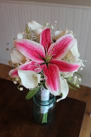 Creamy white vendela roses are mixed with beautiful stargazer lilies for a splash of color and fragrance. Last Minute Silk Bridal Bouquet Silk Wedding Flowers And Bouquets Online Love Is Blooming