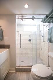 This Simple Design Can Make Any Bathroom Feel Large Bathroom Design White Bathroom Tiles White Subway Tile Shower