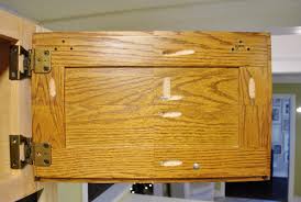 Cabinets in the kitchen often go through severe changes. Cutting Down A Few Cabinet Doors To Fit Young House Love