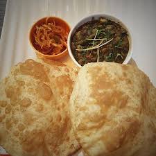 The combination of 'chickpea curry' and 'fried flatbreads' is known as 'chole bhature'. Amritsari Chole Bhature Picture Of Fully Local Restaurant Chennai Tripadvisor