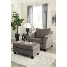 This plush oversized chair and storage ottoman will be a nice addition to your living room, adding high quality comfort that will truly last. Signature Design By Ashley Nemoli Transitional Chair And A Half With Flared Arms And Ottoman Furniture And Appliancemart Chair Ottoman Sets