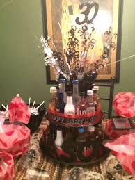 Many of those designs aimed for a small scale, low cost look with hand crafted illustrations, which is in complete contrast to the sophisticated theme of liquors. Birthday Cake With Mini Alcohol Bottles