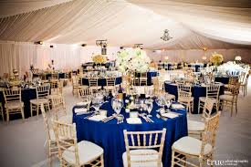 If We Did Round Tables Blue Linen And White Gold Chairs W Gold Detail And White Flower C Blue Wedding Decorations Blue Themed Wedding Navy Blue Wedding Theme