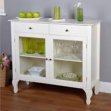 In regards to storage, you have your choice of open shelving, glass doors, or opaque doors. Antique White Sideboard Buffet Console Table With Glass Doors Fastfurnishings Com