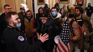 Flag attached to a qanon symbol flies outside the u.s. U S Now Says No Direct Evidence Of Kill Capture Teams So Far In Capitol Riot Capitol Insurrection Updates Npr