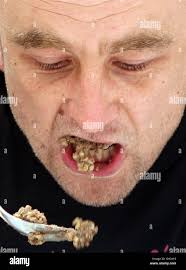 Keith Newton attempts to break the world record with other haggis eaters,  for eating a pound of haggis in under two minutes in Edinburgh Stock Photo 
