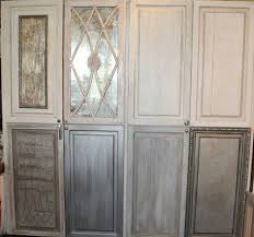 Love The Mercury Glass Aged Mirror Finish In The 2nd From The Left In The Top Row So Prett Glass Kitchen Cabinets Mirrored Kitchen Cabinet Glass Cabinet Doors