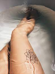 Swimming Lotus Tattoo Flower Leg Tattoo On Tattoochief Com Tattoos Leg Tattoos Beautiful Tattoos