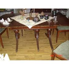 The legs of many duncan phyfe style tables have saber legs that flare out from a pedestal or from stretchers. Duncan Phyfe Three Legged Drop Leaf Table 1660952
