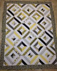This little quilt also has the addition of a cute family of owls, all stitched onto the quilt by hand using blanket stitch. 12 Yellow And Gray Quilts Ideas Quilts Grey Quilt Yellow Quilts