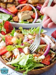 Noodles lettuce cucumber peppers onion and strawberries can l.make a salad with this. Strawberry Fields Salad Video The Country Cook