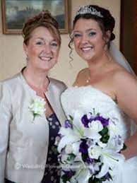 As the bride's mother you want to help your daughter undertake the enormous task that is wedding planning. Real Wedding Jenni S Purple And White Wedding Flowers