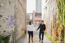 Included are views of the forks of the thames, one london place and the london market building. London Ontario Wedding Photographer Sarah Justin S Downtown London Engagement Session Raw Footage Photography London Ontario Wedding Photographer
