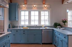 Add a hanging lamp above the countertop to maximise the potential of this space. Magnificent Rohl Faucets Look Boston Beach Style Kitchen Innovative Designs With Alessi Teap Blue Kitchen Cabinets Blue Country Kitchen Interior Design Kitchen