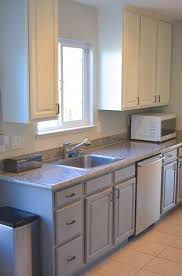 Two Tone Painted Kitchen Cabinets Hello Nutritarian Simple Kitchen Remodel Ikea Kitchen Remodel Affordable Kitchen Remodeling