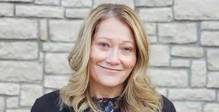 Corporate: Elizabeth Dotson