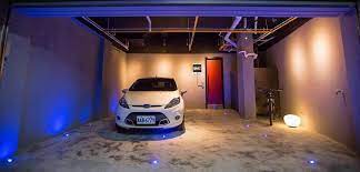 獨創清幽宅業傑室內設計車庫 遮陽棚水泥blue homify vehicles