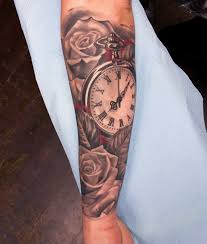 Can you get a tattoo of a rose? Clock And Roses Tattoo By Nino Dinchev Half Sleeve Rose Tattoos For Women Clock And Rose Tattoo Forearm Band Tattoos