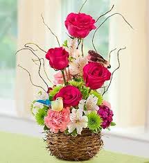 Summertime Bird S Nest Of Flowers From 1 800 Flowers Com Easter Flower Arrangements Basket Flower Arrangements Easter Floral