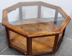 Transparent glass top on is an awesome way for creating the illusion of space in the room. Octagon Coffee Table With Brass Inlays Glass Top Idaho Auction Barn