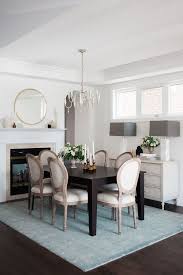 Taking center stage in this dining room by regan baker design is a staggered glass chandelier by west elm. A Sophisticated Dining Room And Photography Studio Collide Rue