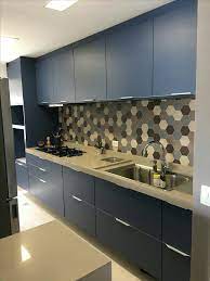 Small Modular Kitchen with Bright Backsplash and Sleek Cabinets