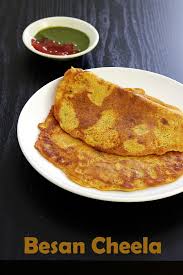 In a bowl, add gram flour, fennel seeds, green chilli, salt, red chilli powder, turmeric powder, coriander leaves and water and mix well to make a batter with medium flowing consistency. Besan Cheela Recipe Besan Ka Cheela Vegetarian Omelette Recipe
