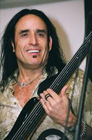 Who is the current bass player touring with Journey?