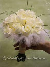 What would your wedding be without fresh flowers? Wedding Flowers With Feathers