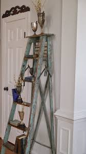 Chateau Chic Using A Tall Vintage Ladder Old Ladder Decor Ladder Decor Vintage Ladder