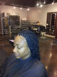 A fun braided updo with a large hair bow on top for a whimsy look. Micro Maintenance All You Need To Know Secret Curl Society