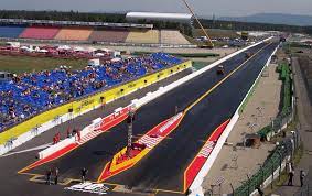The nautical mile (mni) is nearly equal to one minute of arc of latitude along any meridian, and is approximately equal to one minute of arc of longitude at the equator. Dragstrip Wikipedia