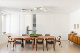 However sometimes we should understand about modern dining room designs ideas to recognize far better. This Apartment Hides The Kitchen Behind Sliding Panel Doors