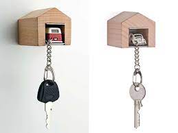 Andre Rumann Designer Andre Rumann Has Come Up With A Cute Key Rack That Looks Like A Miniature Wooden Garage Wher Wooden Garage Wooden Key Holder Key Rack