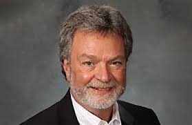 Builder's Insurance Group Manager Chuck Lowe speaks regarding Lighthouse  Award