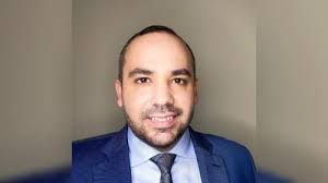 Tesla appoints former Dish Network attorney as general counsel