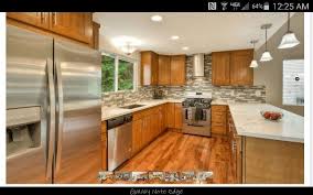 Honey Oak Cabinets With Brushed Nickel Hardware Nice Shiny White Counterparts With Great And Whi Kitchen Remodel Countertops Kitchen Design Kitchen Renovation