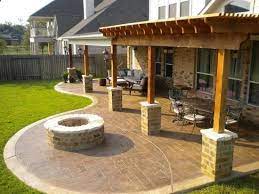 Areas for large patio table and seating around fire pit. Pergola Patio Fire Pit This Continuation Of The Back Patio With The Addition Of The Pergola Is Kind Of What I Want In Our Backyard Patio Patio Patio Design