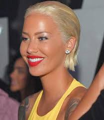 This short, sleek boy cut combines added length in the top and sides for a slightly asymmetrical look with shattered bangs to reflect one of the latest style trends offered in today's top salons! 20 Chic Black Women Short Hairstyles