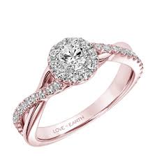 The design serves to make the center stone look larger while maximizing its brilliance. Arthurs Collection Halo Rose Gold Diamond Engagement Ring Designer Engagement Rings Fine Jewelry Arthur S Jewelers